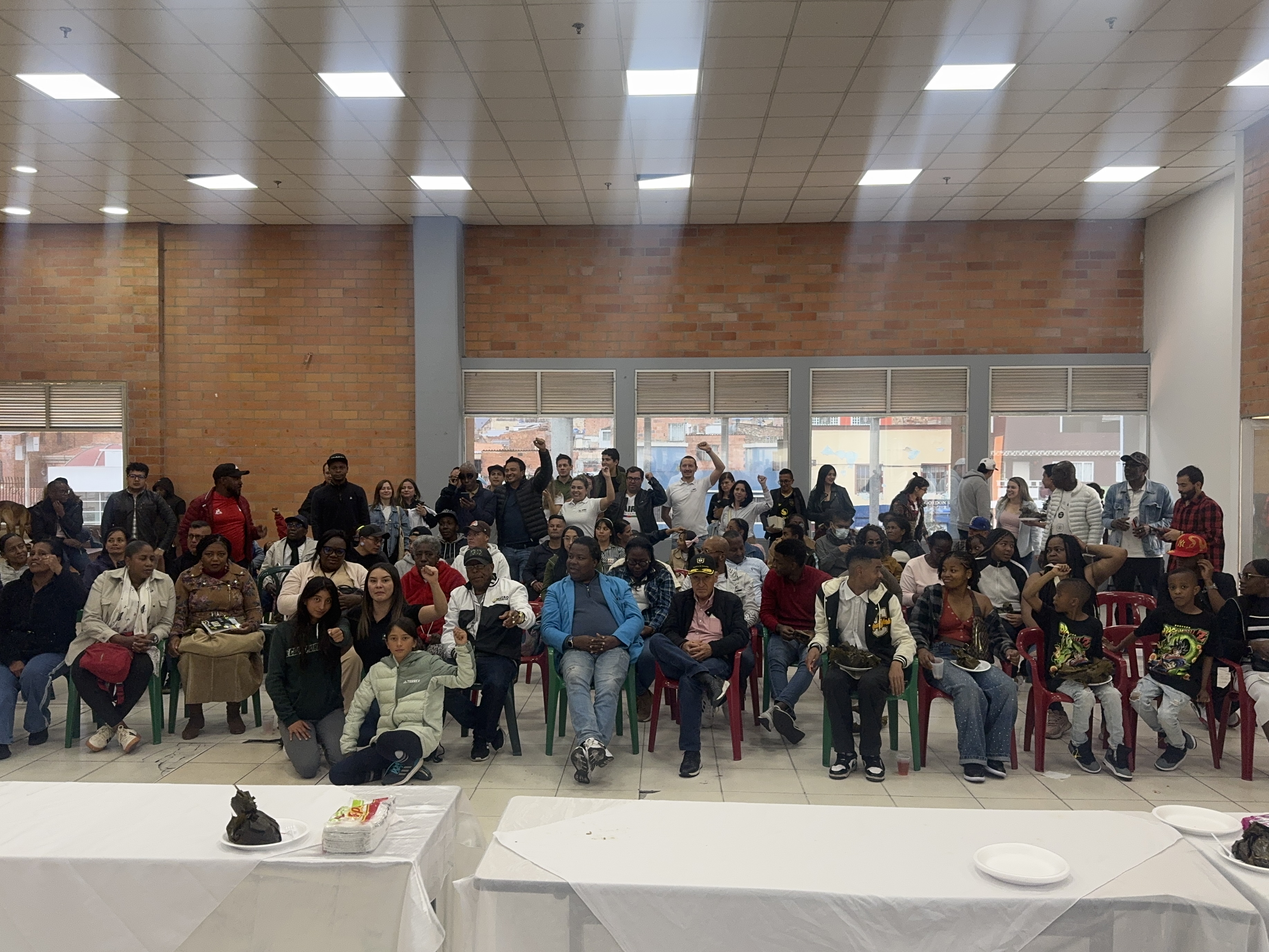 Close-up of a Transmilenio bus on a city street.