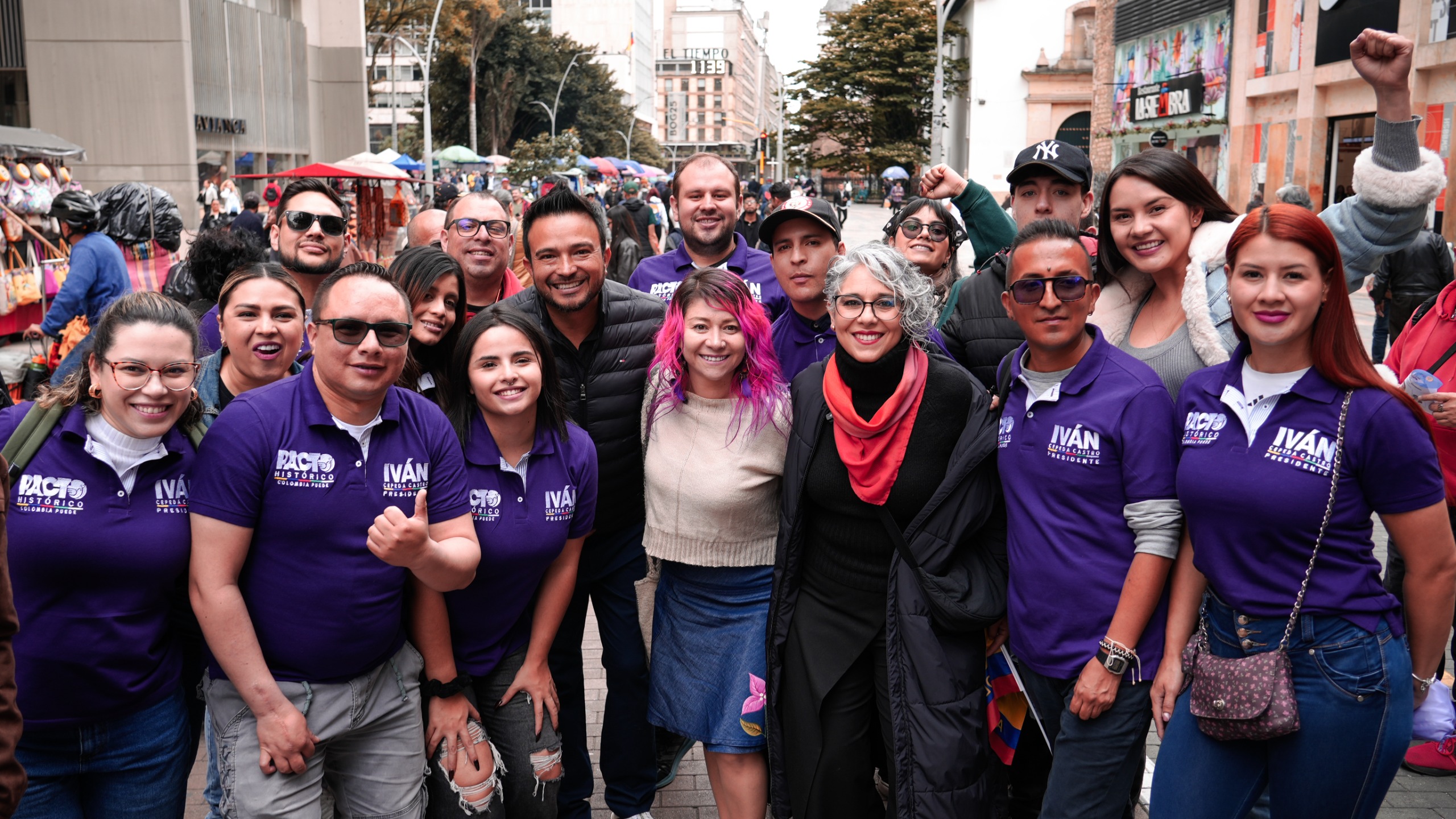 Person speaking into a megaphone at a rally